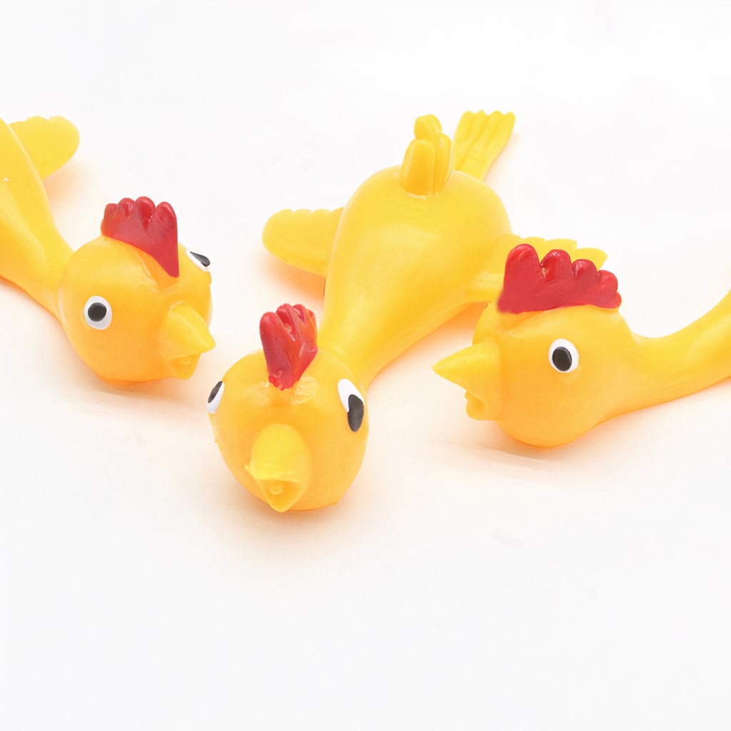 85479-ccfe1daabfde6953598469ae972aed04.jpg Slingshot Chicken Toy