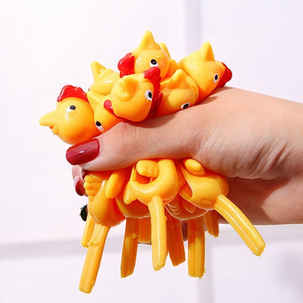 85479-d92bf28526f47a5b2d523cd5cb144cee.jpg Slingshot Chicken Toy